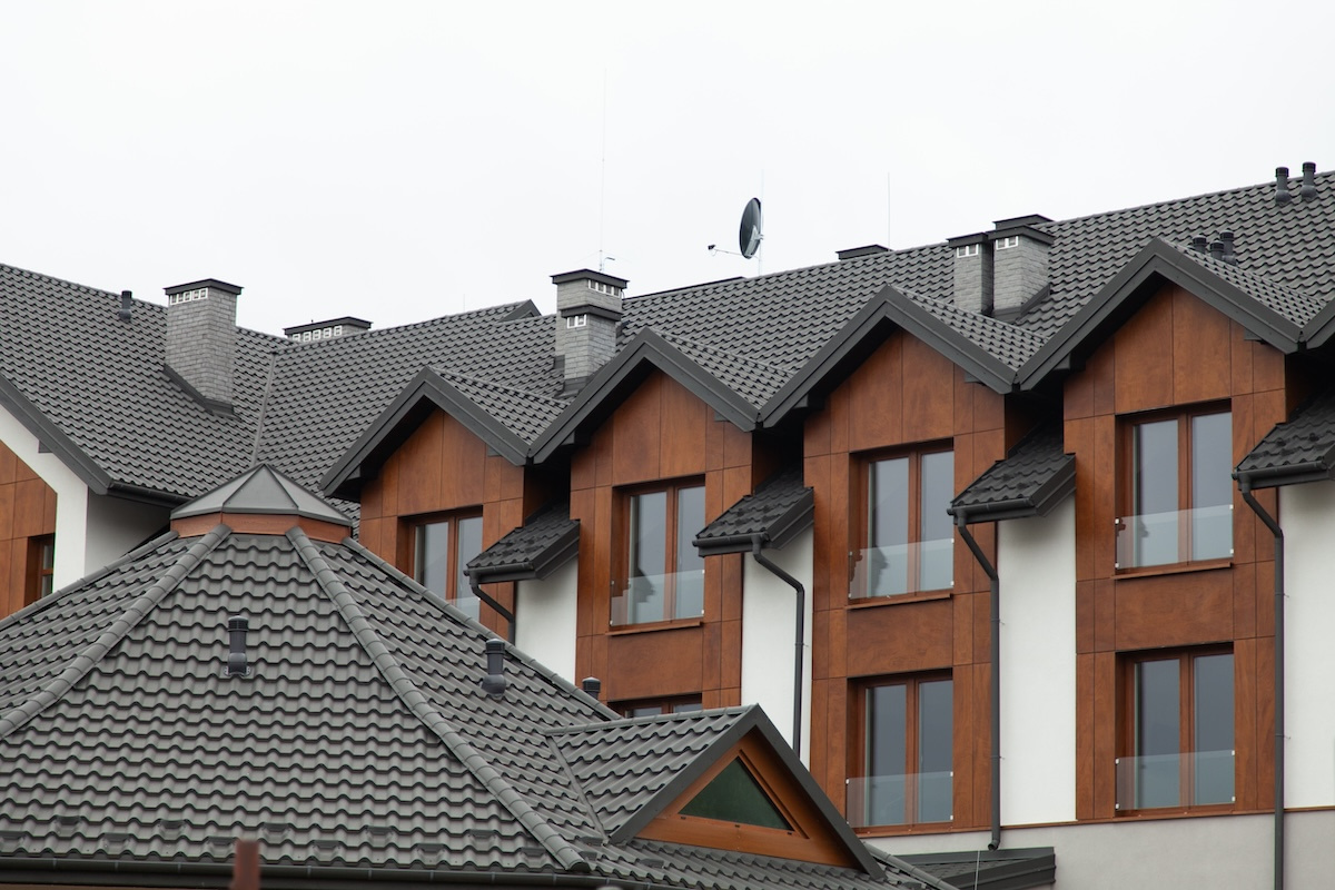 Chimney flashing installed on modern newly built apartment complex