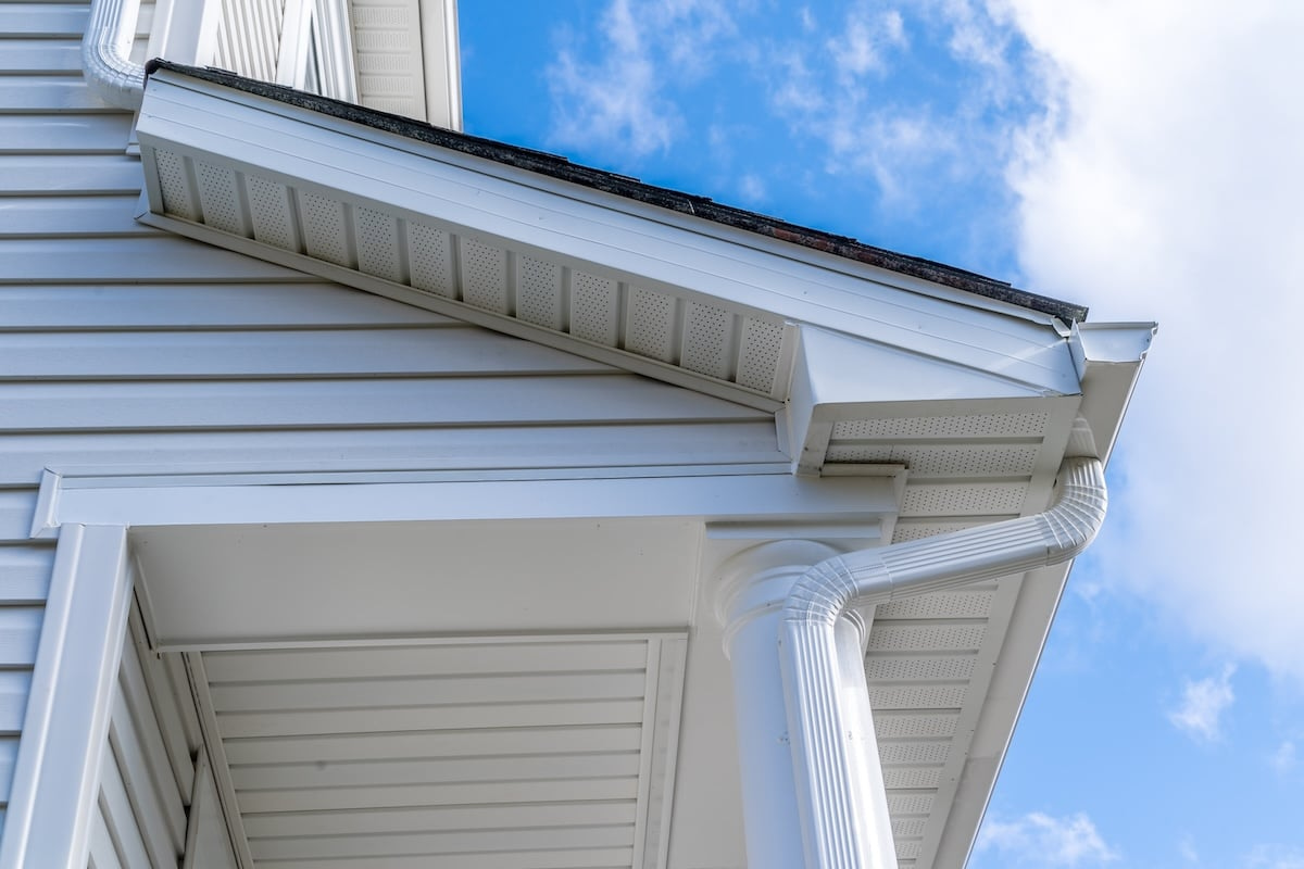 White house with white gutter system and soffit, fascia