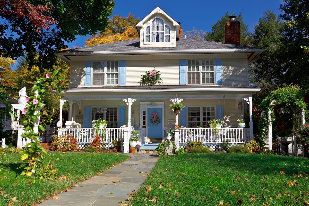 Tidy Prairie Style house with Victorian embellishments in the fall.