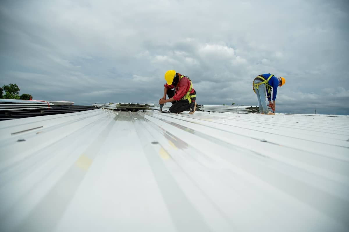 workers installing metal roofing downingtown pa