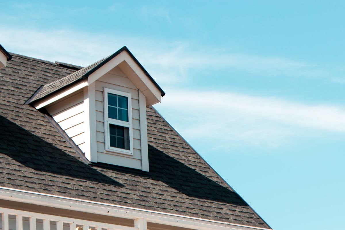 roof and a window against the blue sky