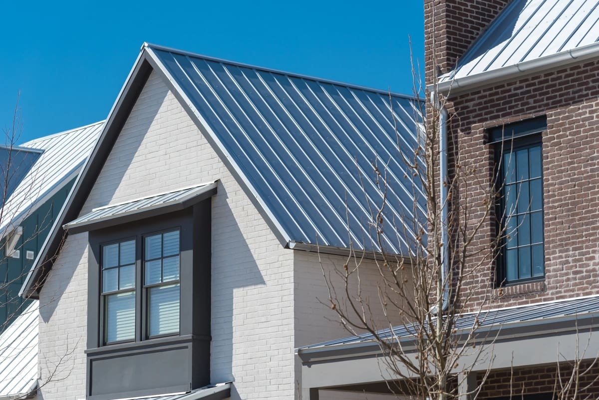 siding and metal roof combo