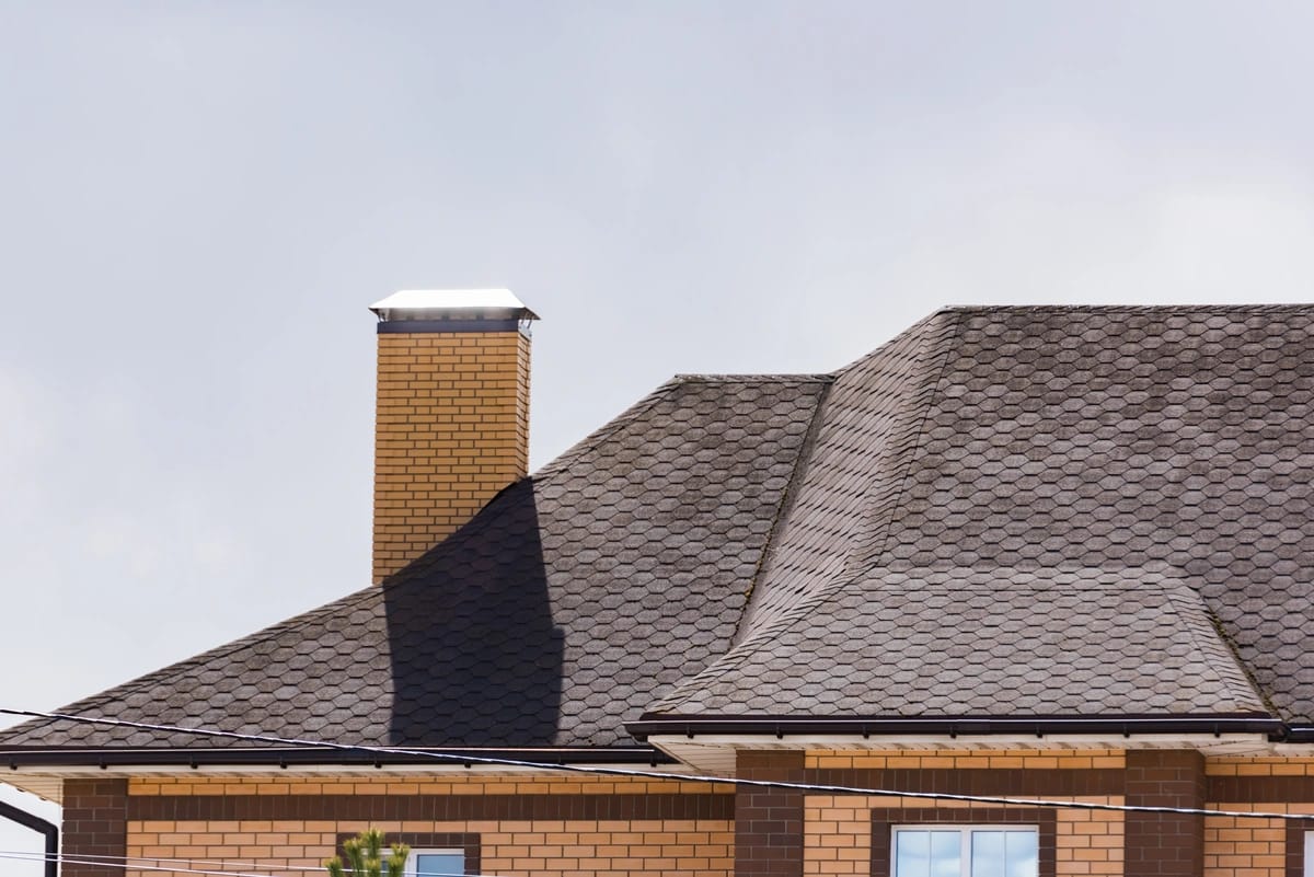asphalt shingle roof and chimney