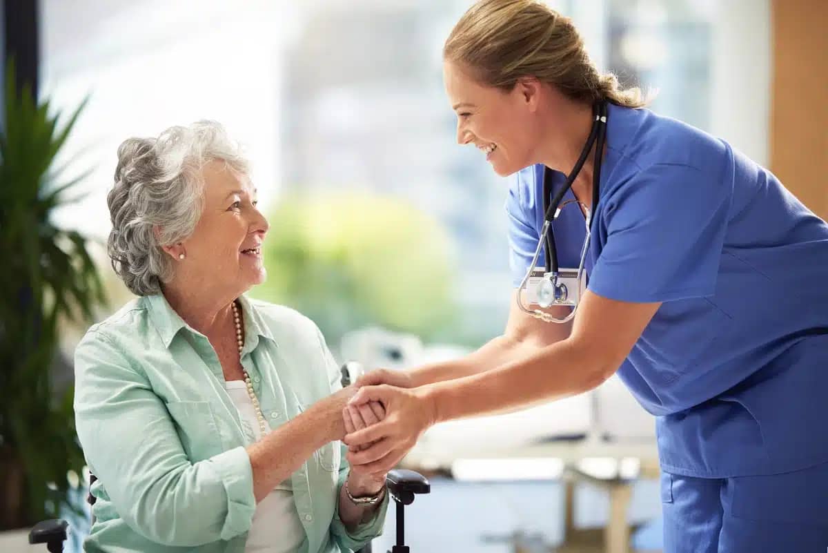 close up to caring doctor and elderly woman