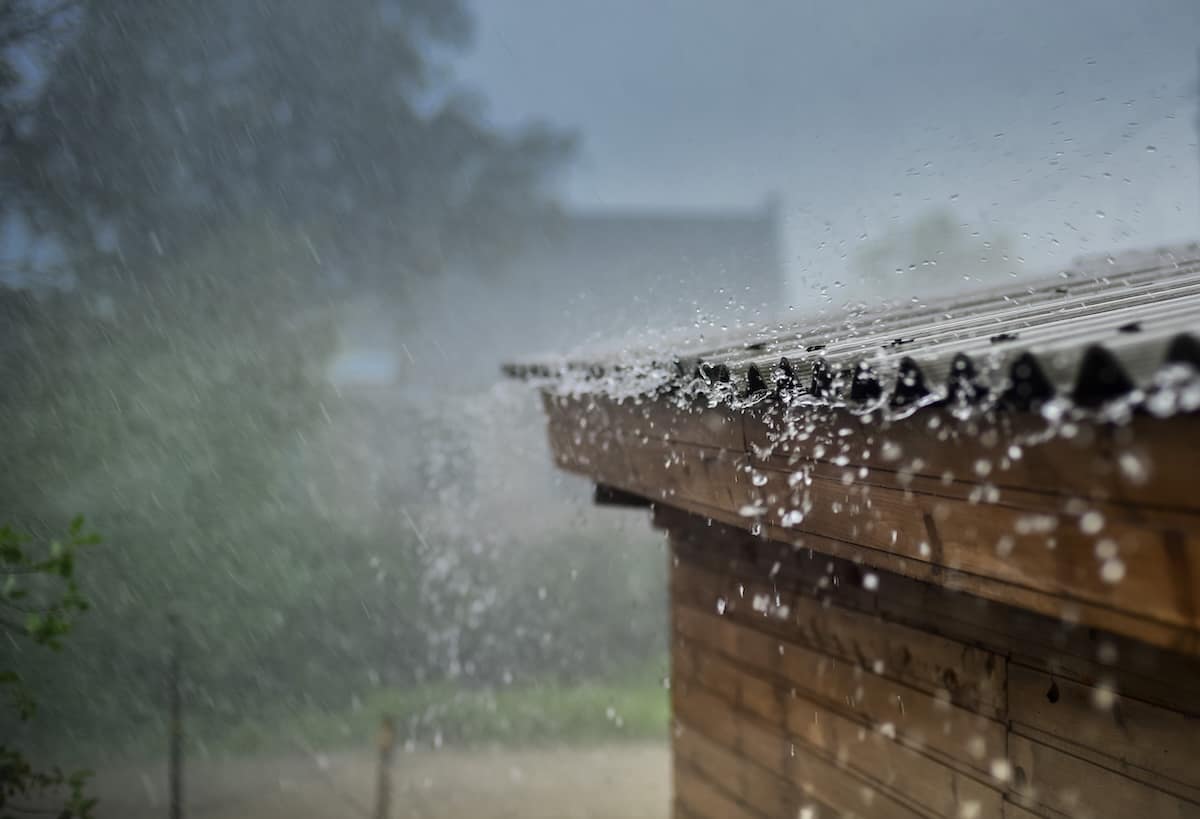 rain flows down from a roof down