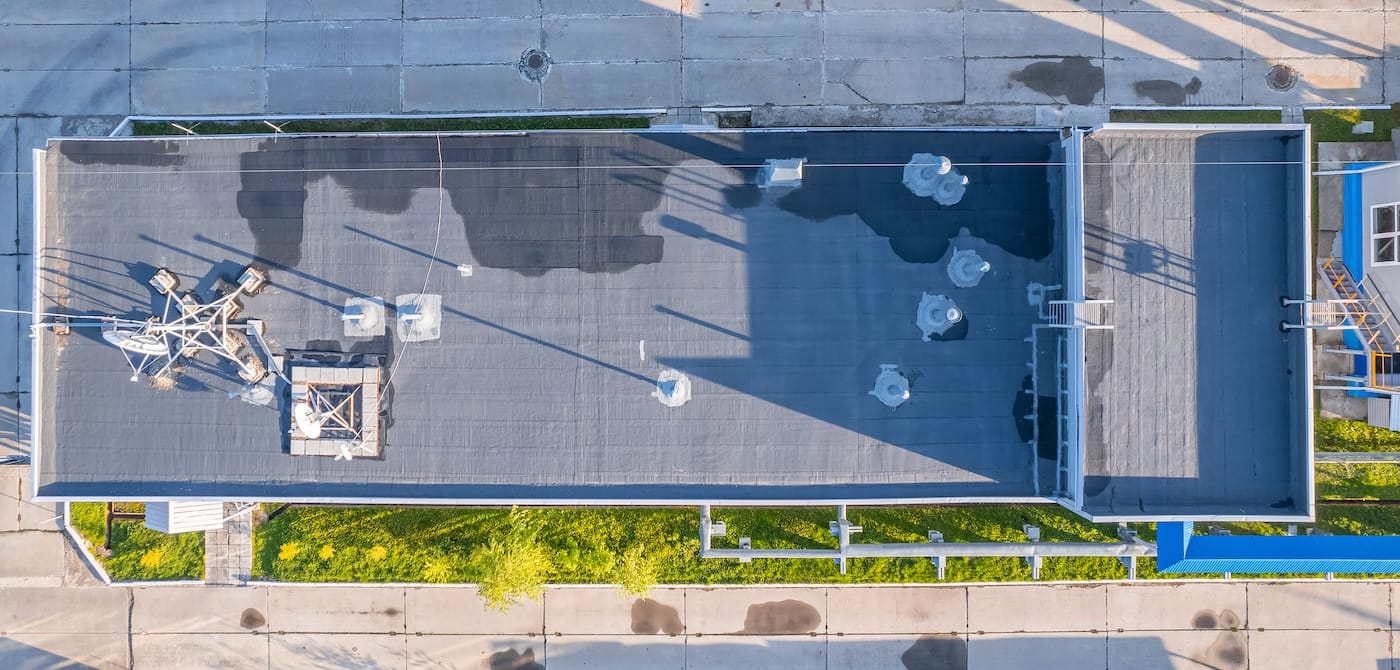 aerial view of black epdm roofing commercial building