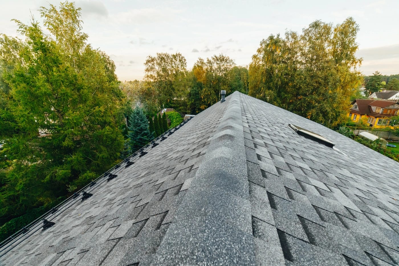 Ridge view of new storm damage roof repairs on shingle roof in Silverdale, WA