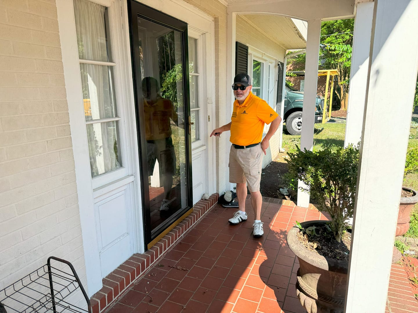 Luis Camacho, G and Bros Roofing sales employee, door knocking to sell a roof. Salisbury MD