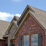 Home with asphalt shingle roofing