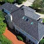 Brava slate roof installation on large roof with roof vents and skylights