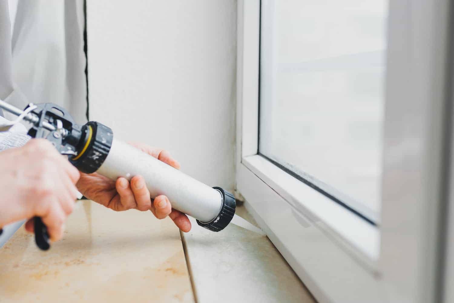 how to install windows using a caulk gun to seal windows