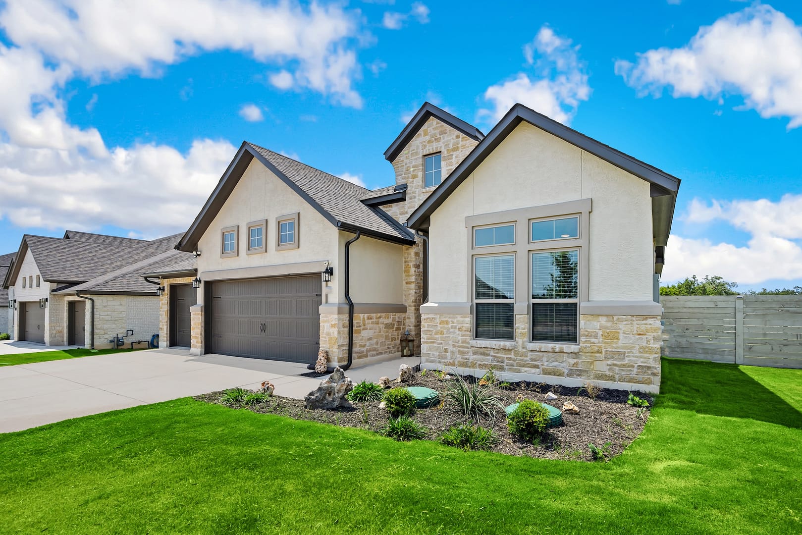 a family home with a green lawn