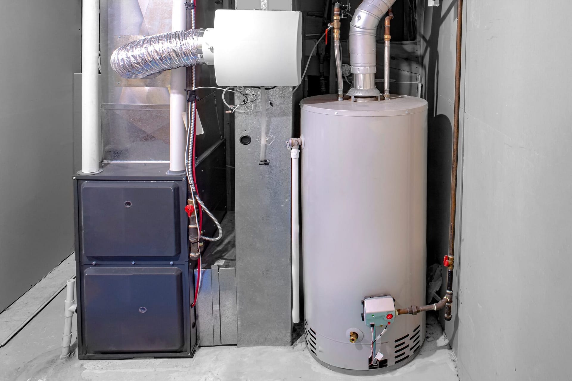 A home high efficiency furnace with a residential gas water heater & humidifier.