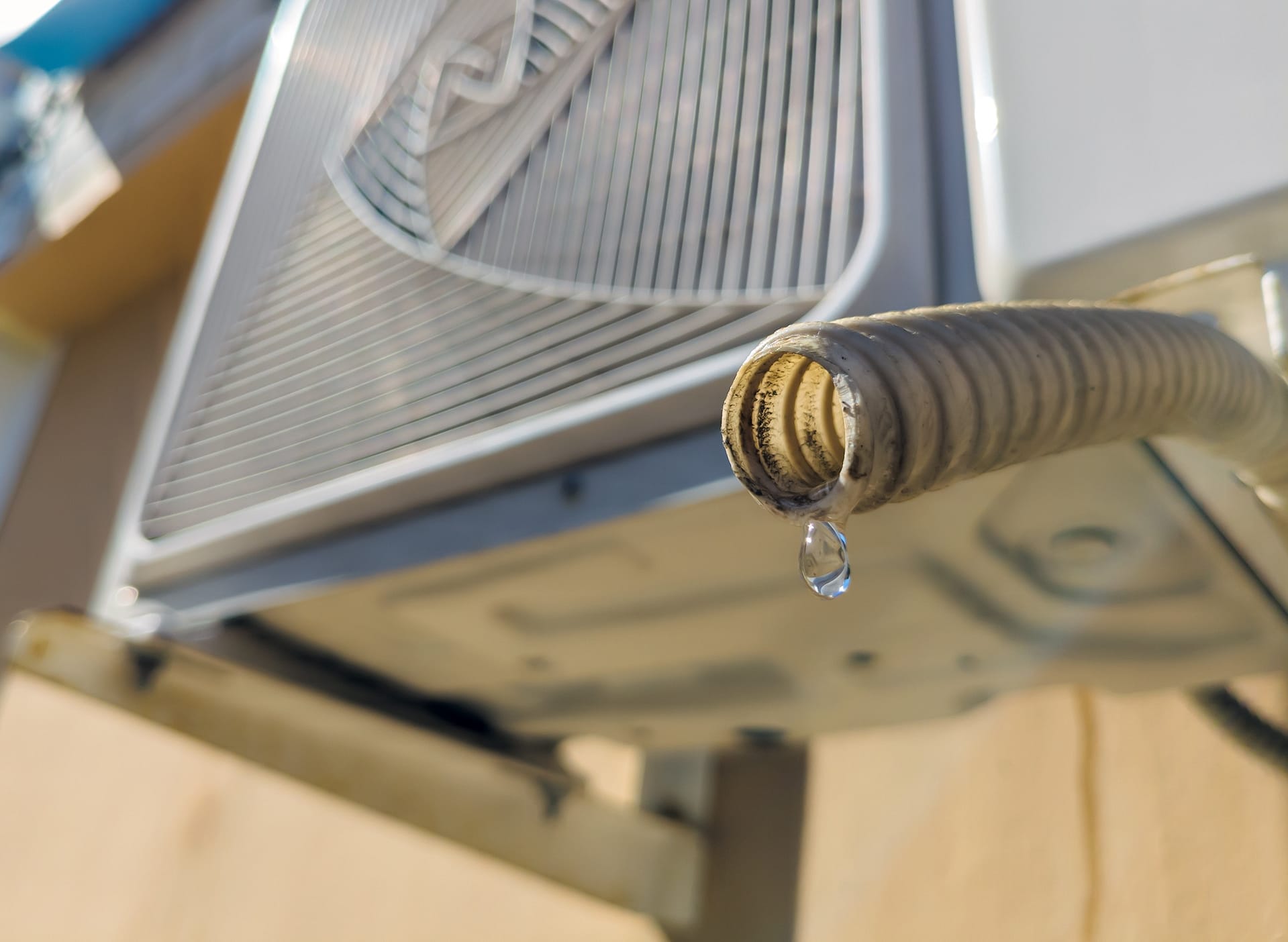 Water dripping from the drain pipe of the outdoor unit of the air conditioner,