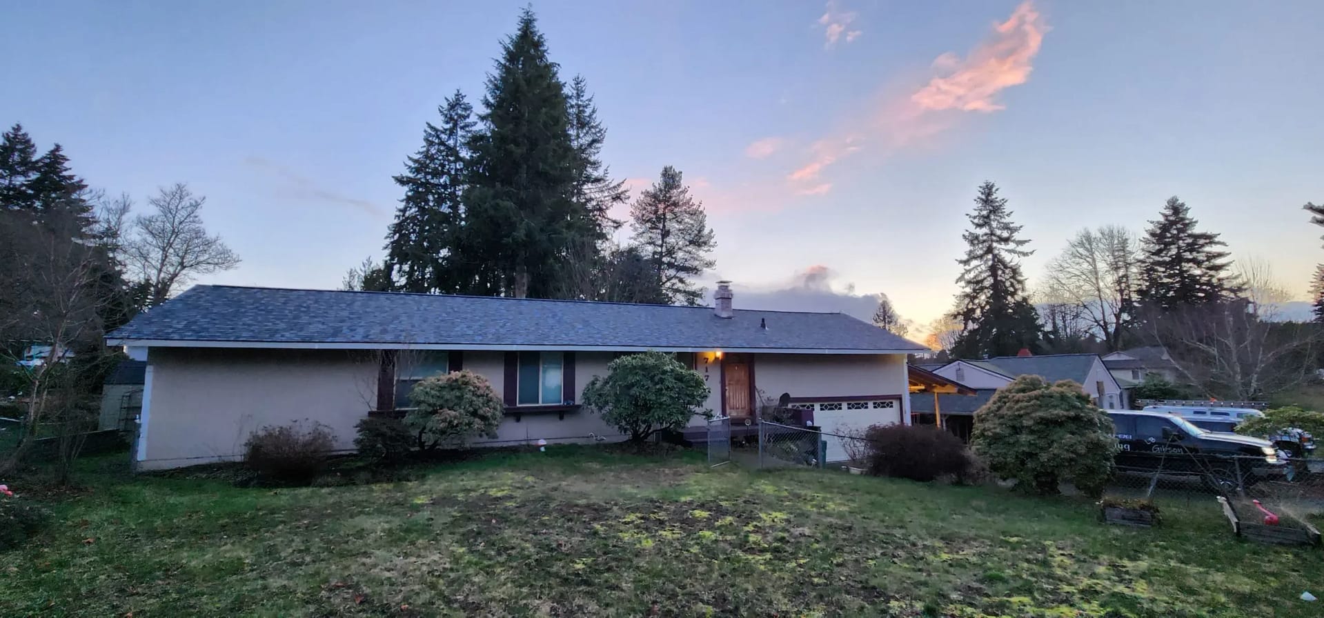 new asphalt shingle roof on a home in washington during sunset