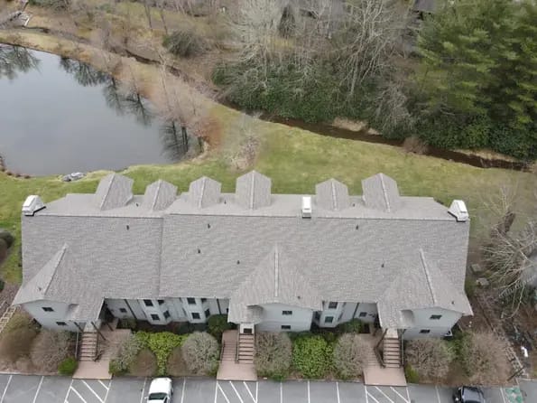 Multifamily house roof drone view