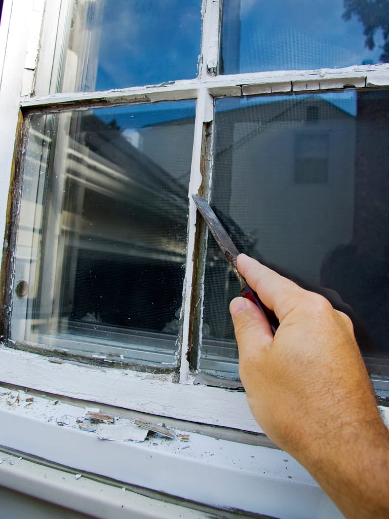 using putting to show how to repair cracked window glass