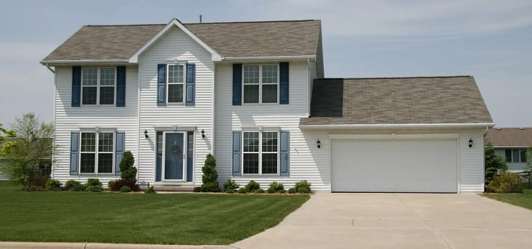 white vinyl siding on two story house