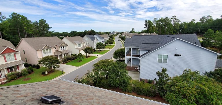 arial view of well maintained residential neighborhood rooftops