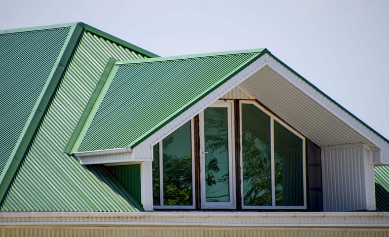green metal roof with windows