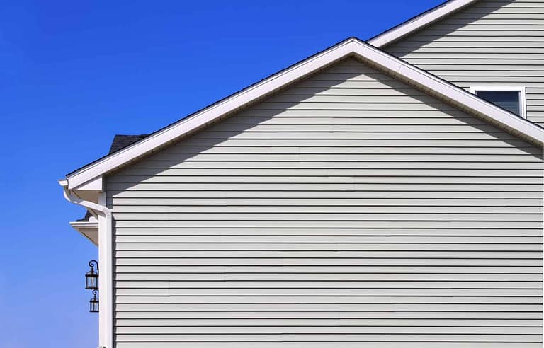 how long does vinyl siding last side view