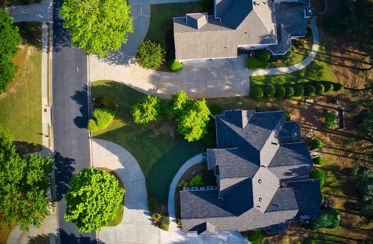 aerial view of suburban house roofs