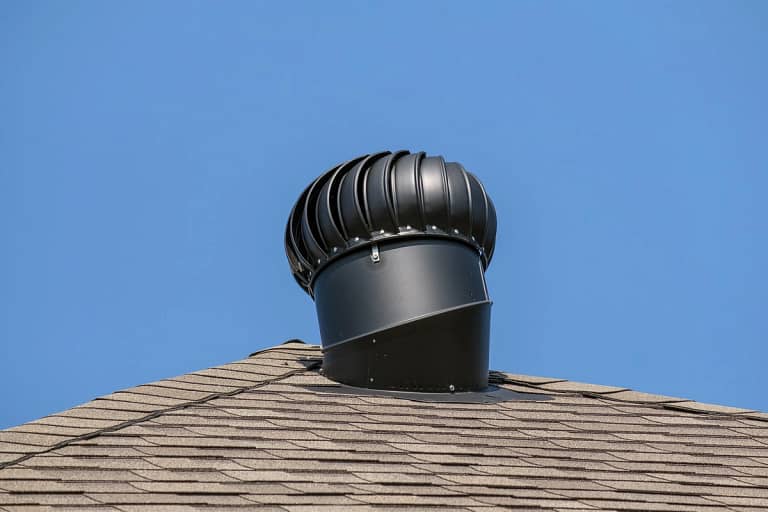 black roof vent against the sky