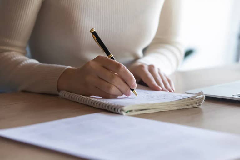 writing in notebook