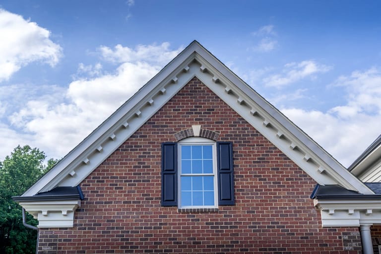 gable roof brick house frieze boards