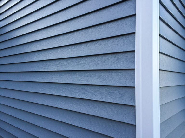 close up photo of gray siding