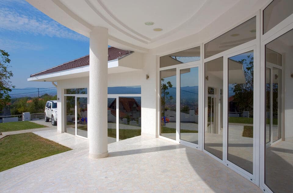 window replacement floyds knobs ky-outdoor view of floor to ceiling winodws on a home