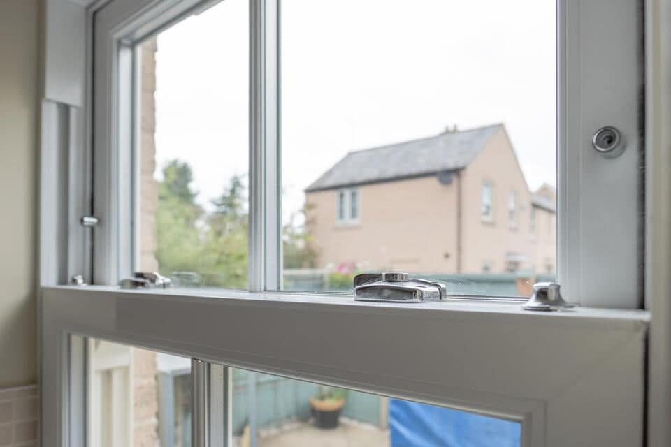 what is a window sash-close up view of a window sash inside a home