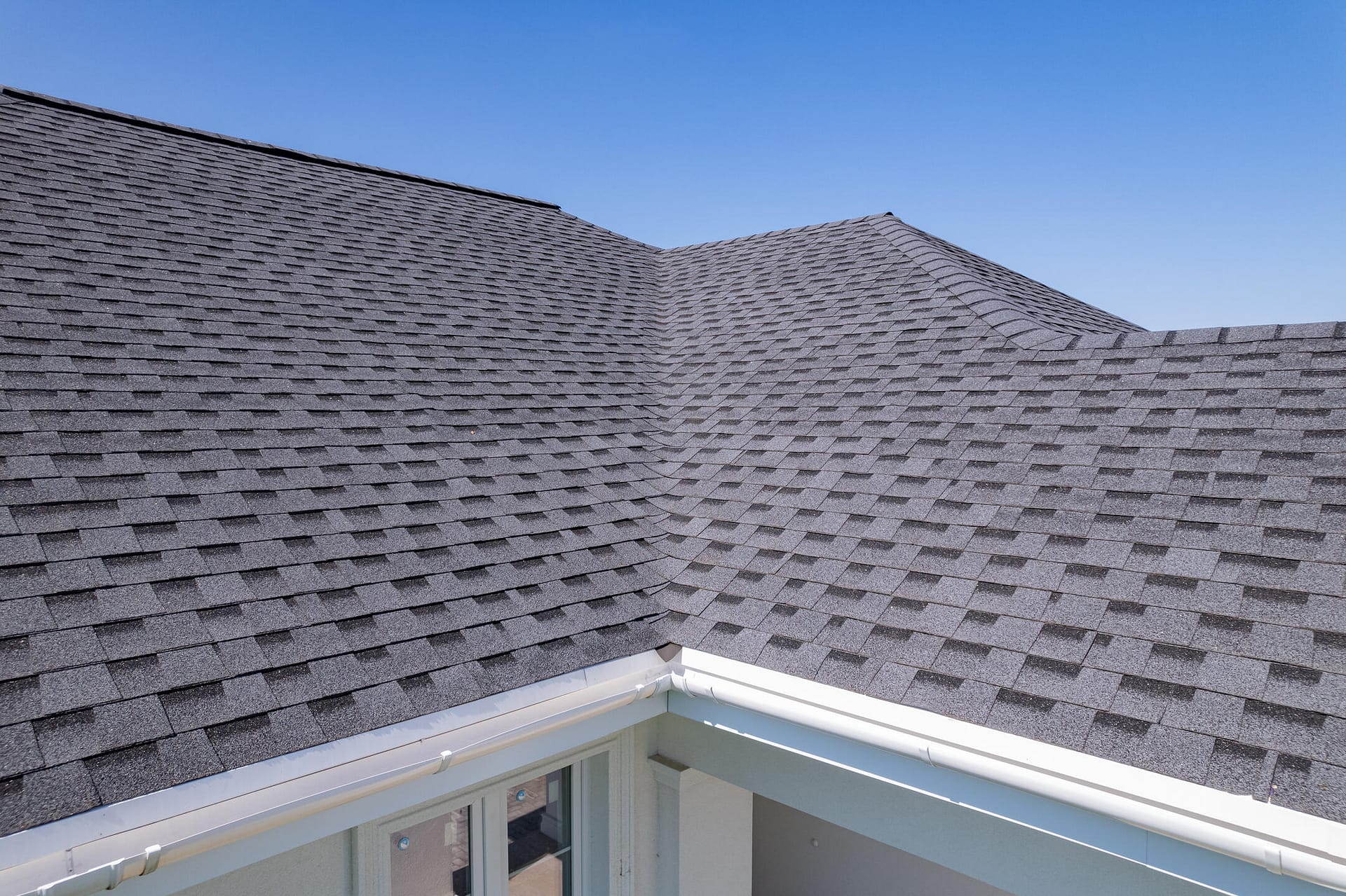 roof replacement cost-new shingle roof on a residential home
