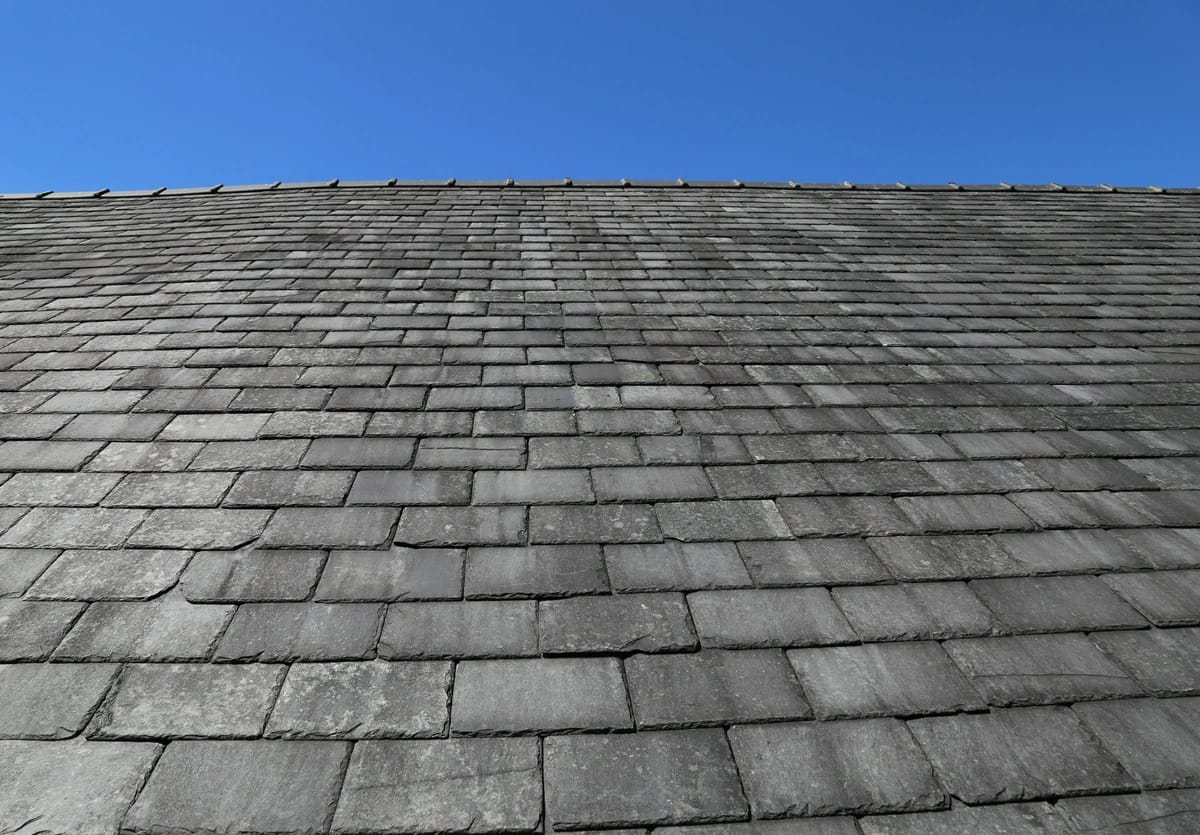 slate roof against blue sky