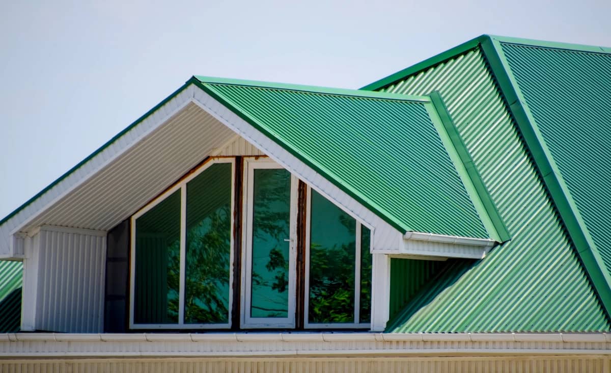 green corrugated metal roof on house
