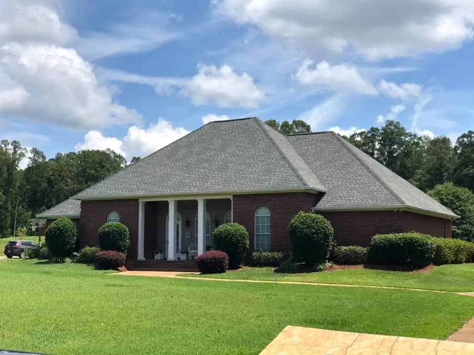 one floor house with asphalt shingle roof